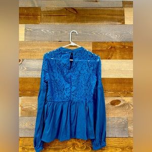 Blue lace peplum style blouse